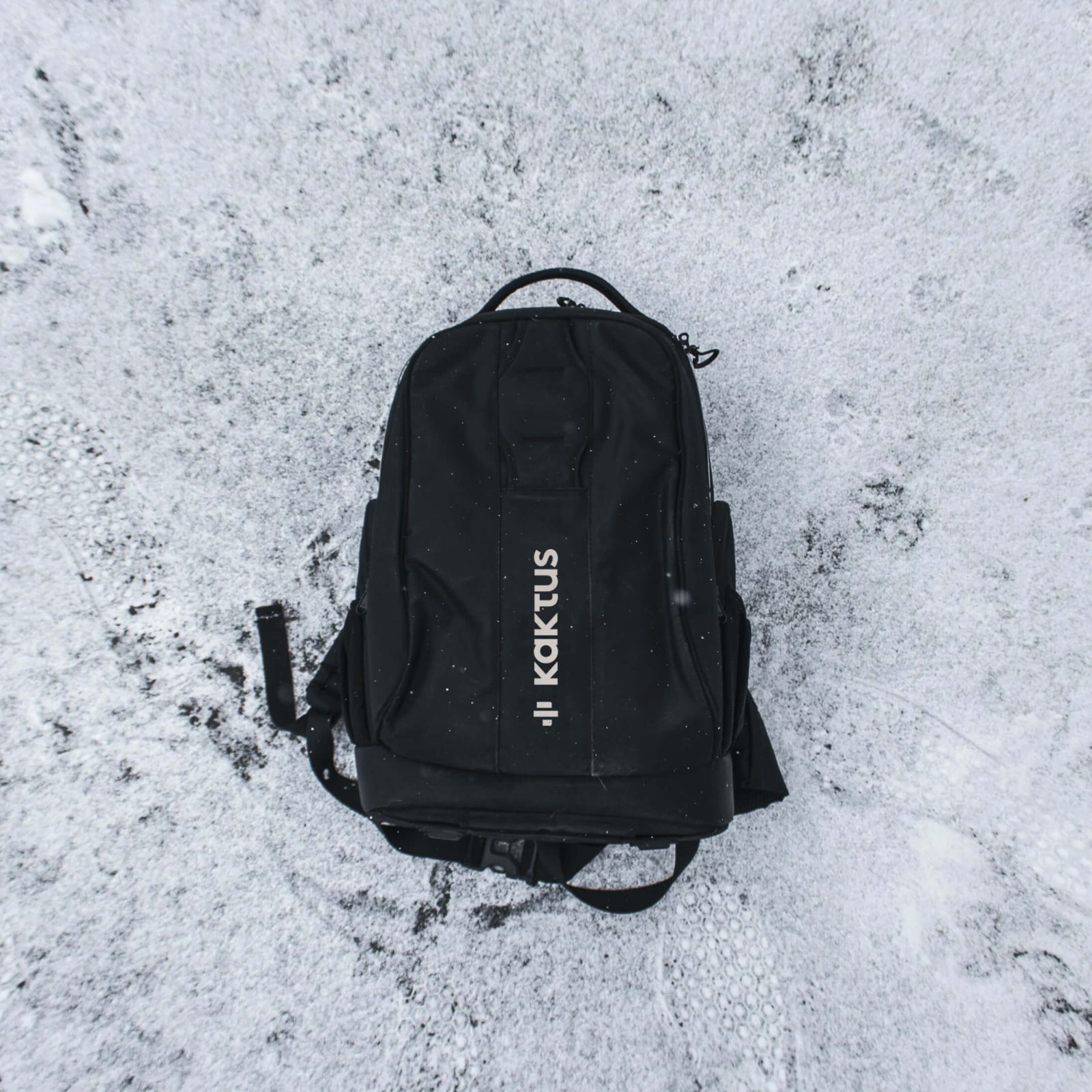 A black backpack with the word 