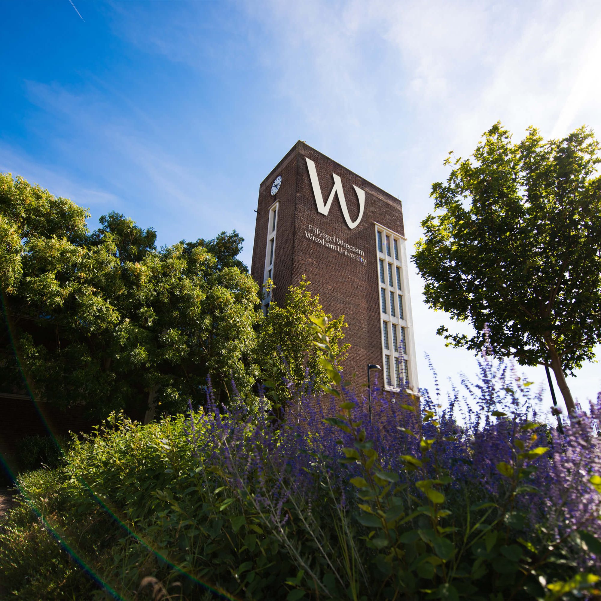 A modern brick building featuring a large white 