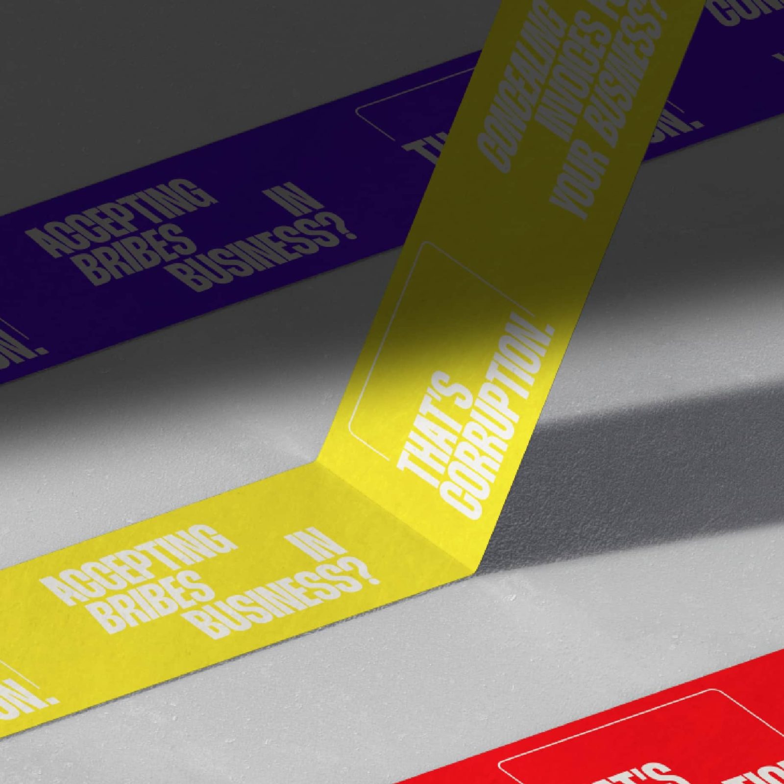 Yellow, purple, and red ribbons printed with 