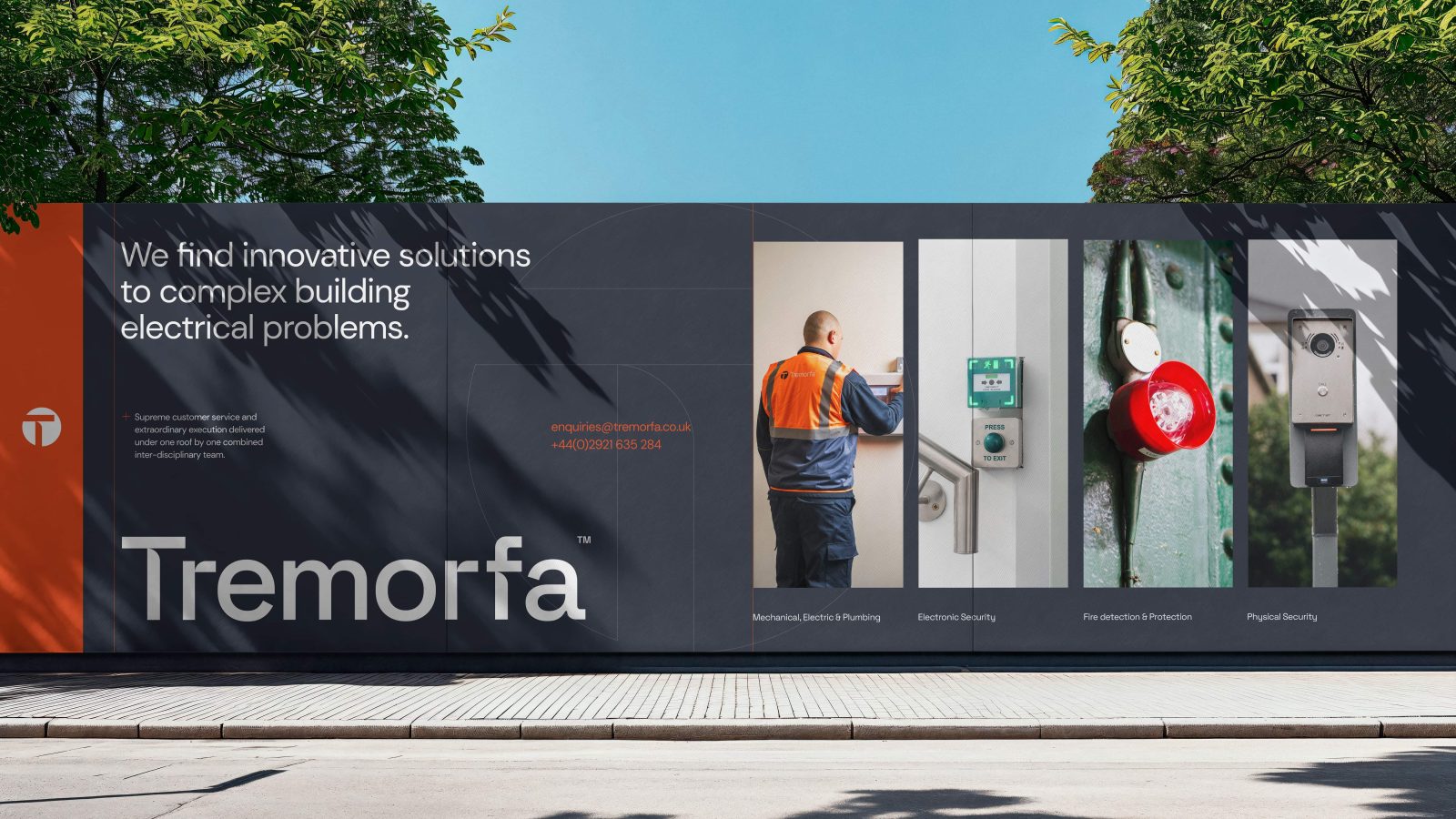 Billboard for Tremorfa, a trusted Welsh brand, showcasing solutions for complex electrical problems. Features a worker and various electrical devices to recalibrate your trust in expert craftsmanship.